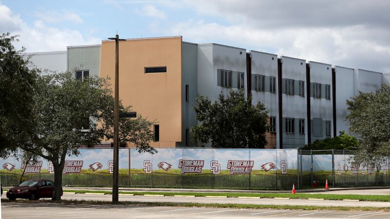 FILE - The 1200 building at Marjory Stoneman Douglas High School in Parkland, Fla., is seen,...