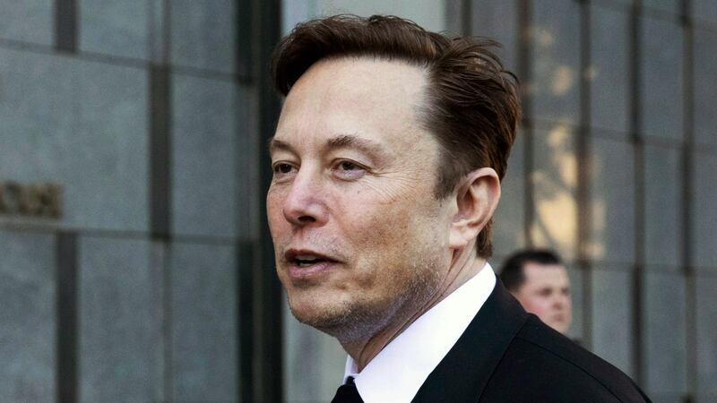 FILE - Elon Musk departs the Phillip Burton Federal Building and United States Court House in...