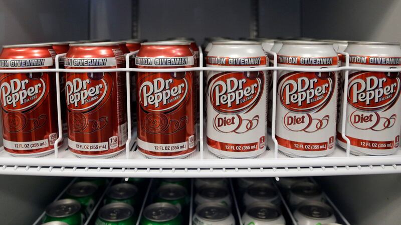 In this Oct. 6, 2013, photo, Dr Pepper cans are refrigerated at Soldier Field in Chicago.