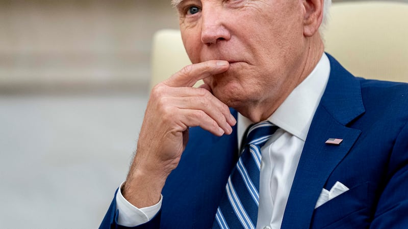 FILE - President Joe Biden meets with Indonesia's President Joko Widodo in the Oval Office of...
